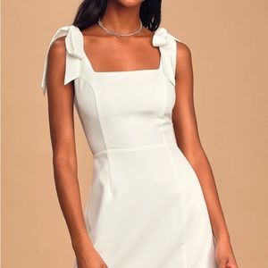 Brand new white mini dress with tie straps